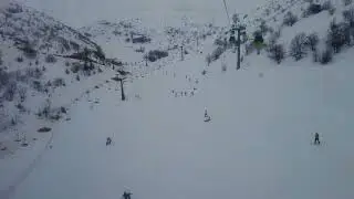 Free clip: Ski at a Snowy Mountain - No copyright.