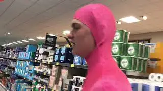 Magenta Man goes to aldi to look for a neck pillow and buys some milk