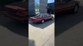 Jaguar Vanden Plas with a CellularOne Car Phone and rear picnic tables at Auto Parts City #Jaguar