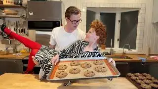 man teaches a woman how to bake
