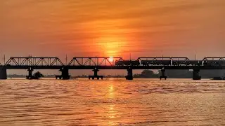Spectacular view of Malabar Express crossing Netravati river bridge at sunset!