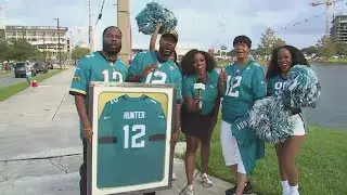 Waycross woman receives signed jersey from Travis Hunter after chance encounter