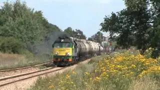 ST44-2030 i ST40s-01 ze składem towarowym - Werbkowice