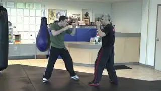 Straight Punch Defense:  Over The Top Sliding Punch