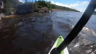 Paddling the eddy line out on Snows cut