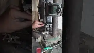 pressing pins for shoe buckle on a manual press. #