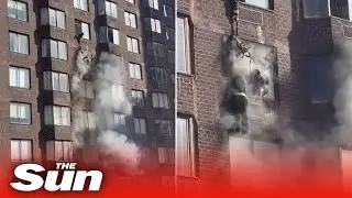 NYC firefighters rescue woman dangling from window during apartment blaze