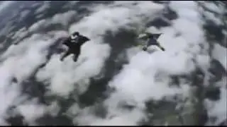 WINGSUIT FLYING LIKE DARING BRAVE EAGLES (Norm Rasmussen)