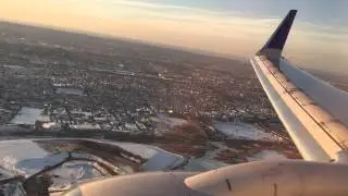 United Airlines 737-800 landing EWR newark airport - Downtown Newark Snowy Airport