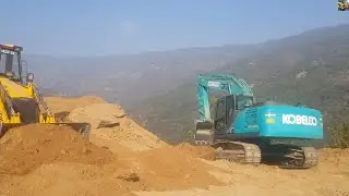 Mahindra Backhoe Loader and Kobelco Excavator- Cutting and Leveling Hilly Road