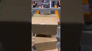 Automatic carton flaps folding sealer with carton corner taping machine. #machine #packing #carton