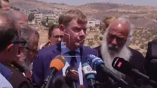 Germany is not recognizing a Palestinian state as a first step, foreign minster says on visit to Wes