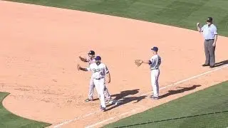 Dodgers turn a triple play on a bunt in front of the plate