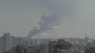 Smoke billows over Tel Aviv skyline amid reports of more Iranian strikes