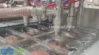 Thermoforming vacuum packaging machine with automatic filling device for vacuum packaging of sauces