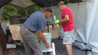 Seacast mixing and pouring into transom