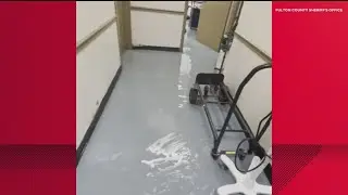 Crews assess damage at Fulton County Jail after pipe bursts in bathroom
