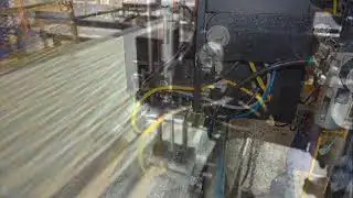 Label Printer Applicator Printing and Applying Labels on Sheets of Steel