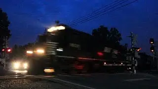 NS standard cab Dash 9 leader heads west on the Detroit District w/ NS Empty Grain Train 55W