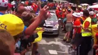 Adam Hansen downs a pint on Dutch Corner Alpe d'Huez