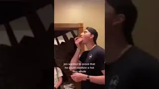 Guy tries to swallow a Hot Dog whole