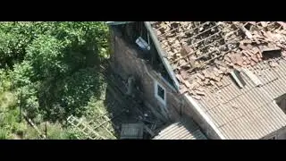 Unbelievable Video Showing A Russian Soldier Throwing A Mine Inside a House Like Hand Grenade