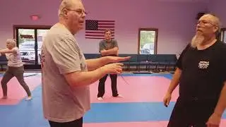 Forehand ice pick grip and blade strip with arm break.