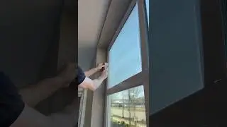Applying Solar Gard 5 mil Safety Frost on Holiday Inn Express Hotel windows