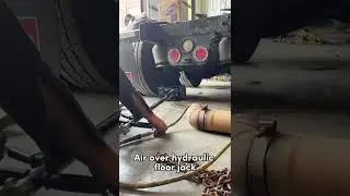 Air over hydraulic floor Jack for lifting semi truck axle and tires #shorts #jack #mechanic