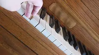 Keyboard piano sounds. Keys change.
