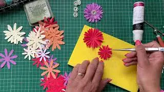 Create quick and easy flowers with a flower punch and coloured paper
