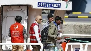 Migrants arrive in Turkey after being sent back under EU deal