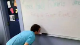 Tom blows an eraser
