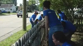 Volunteers help elderly woman clean up and fix up her Hampton home