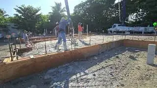 CONCRETE BOOM PUMP TRUCK IN ACTION