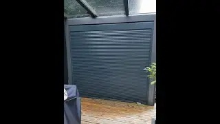 Secure & Private Veranda with Solar Powered Roller Shutters: Supplied and installed by SBI Ltd.