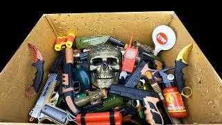 Box of Combat-Style Toy Guns, Knives & Tactical Gear &ndash; Skull Mask, Pistols, Shotgun & More!