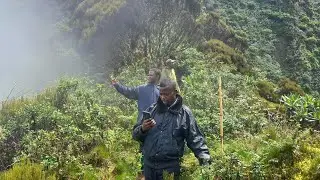Hiking Sabyinyo in Rwanda with @tourismlovers250