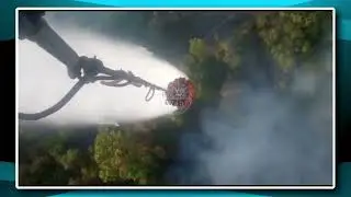 Glimpses of Indian Air Force putting out the fire for Goan hills, IAF helicopter spraying water.