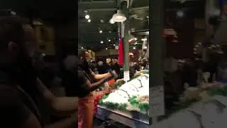 Pike Place fish market, Seattle, WA. This playful throwing of fish is said to be known for decades