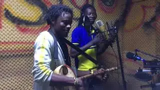 DK Baba playing kologo live in studios