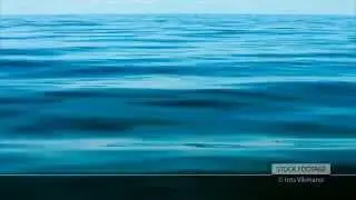 Stock Footage: Blue calm sea water background