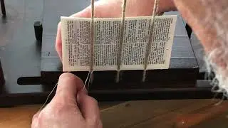 stitching text block of 1777 New Testament
