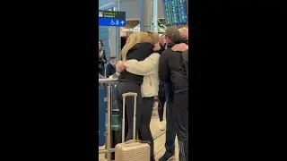 Hugs at Dublin Airport Arrivals