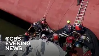 Crew members rescued from overturned cargo ship