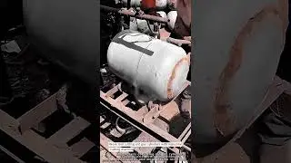 Work tool cutting old gas cylinders with industrial cutting machine