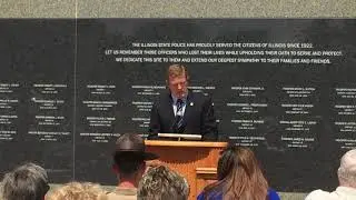 ISP Acting Director Brendan Kelly speaks about Trp. Jerry Ellis at a ceremony at ISP Memorial Park