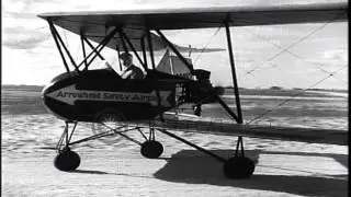 Arrowhead Safety Plane of 1930's flying in the air. HD Stock Footage