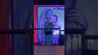 My mom singing at my school function 