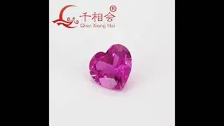 dark pink color heart shape artificial ruby natural cut including minor cracks and inclusions corund